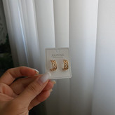 گوشواره حلقه ای طرح کارتیه رنگ طلایی